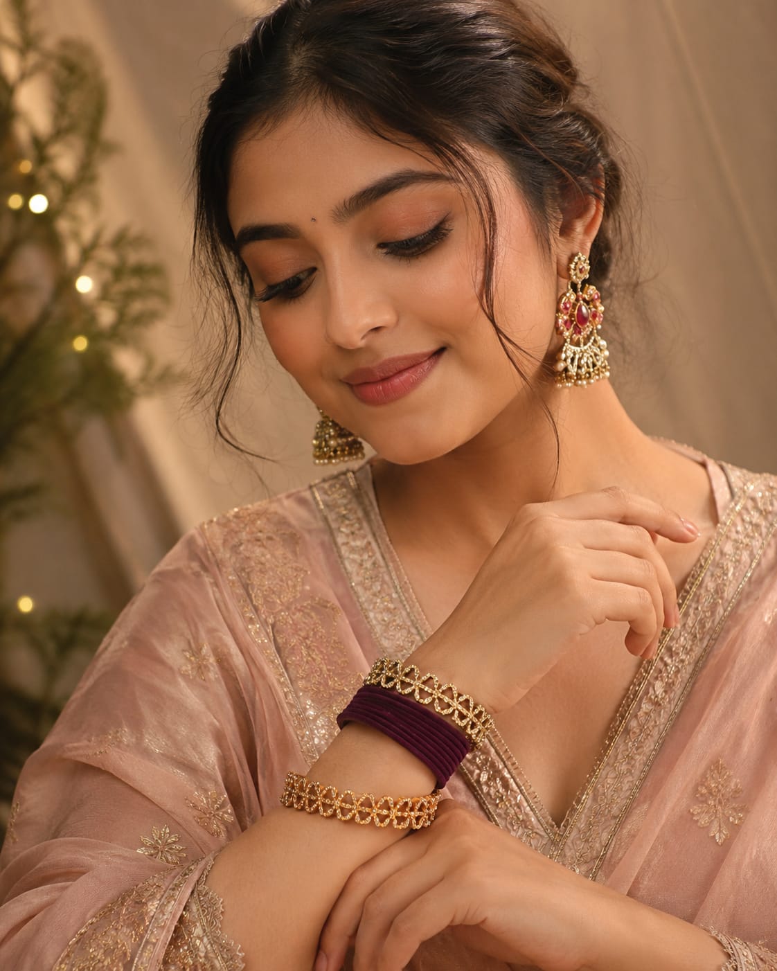 Gold set worn by model in low-key studio light